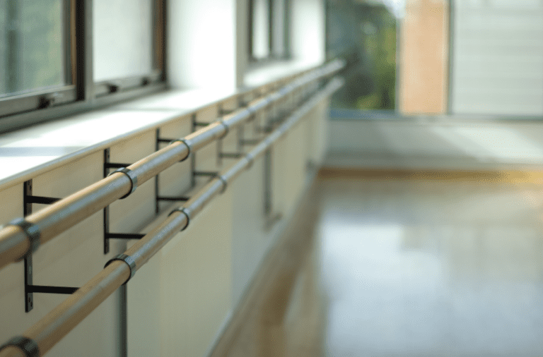 Picture of dance studio with ballet barre