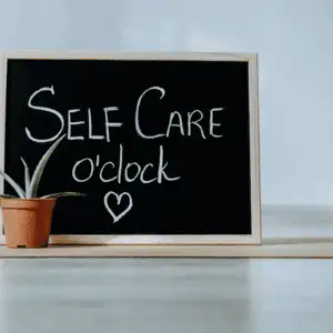 Photo with words Self Care o'clock